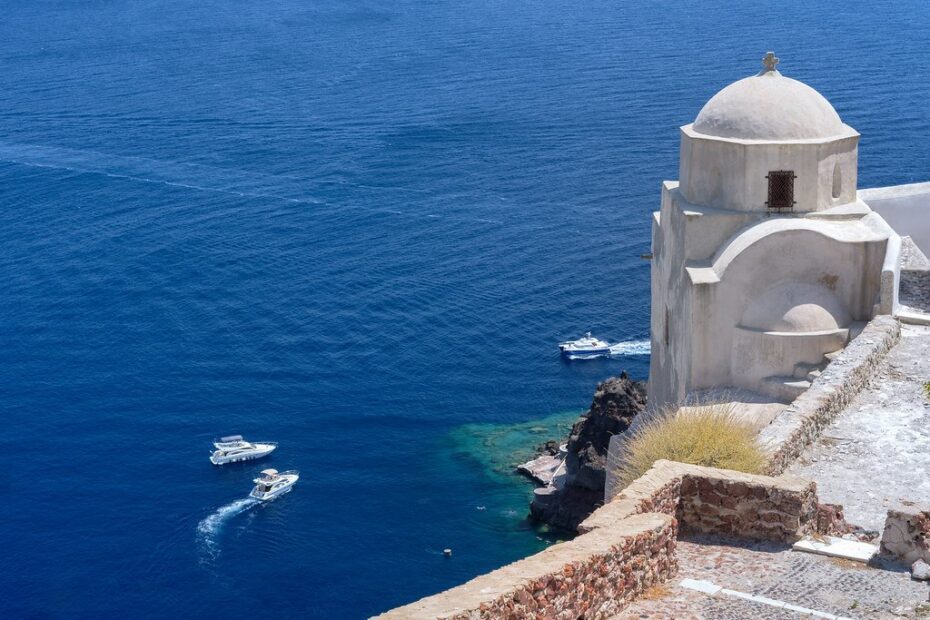 White church above the deep blue sea on Santorini