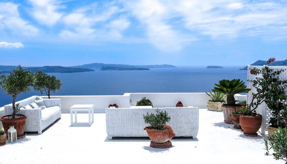 Villa terrace with seating overlooking the Santorini caldera